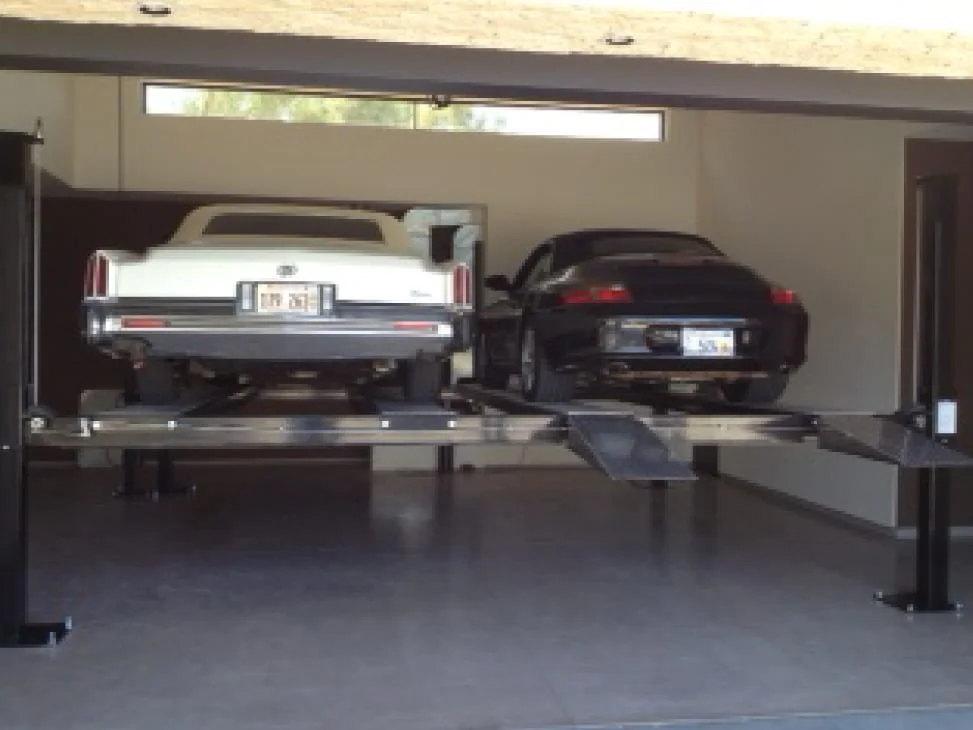 two cars lifted at once
